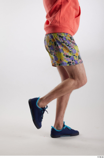 Nigel 1 blue sneakers dressed flexing floral printed shorts leg…